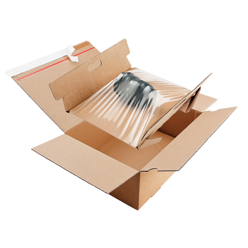 Multisnap Fixierverpackung in den Karton einsetzen